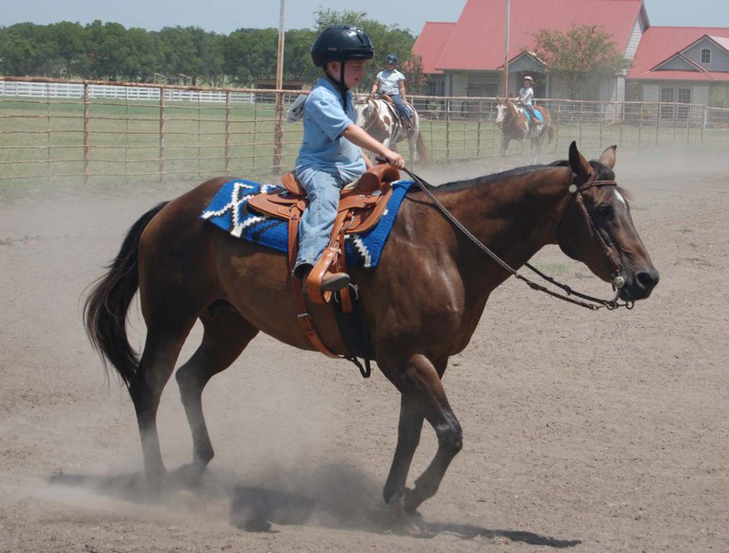 Image: Hunter Hinz and Rita — Hunter Hinz of Italy placed second in western walk trot and won walk and whoa aboard Rita.