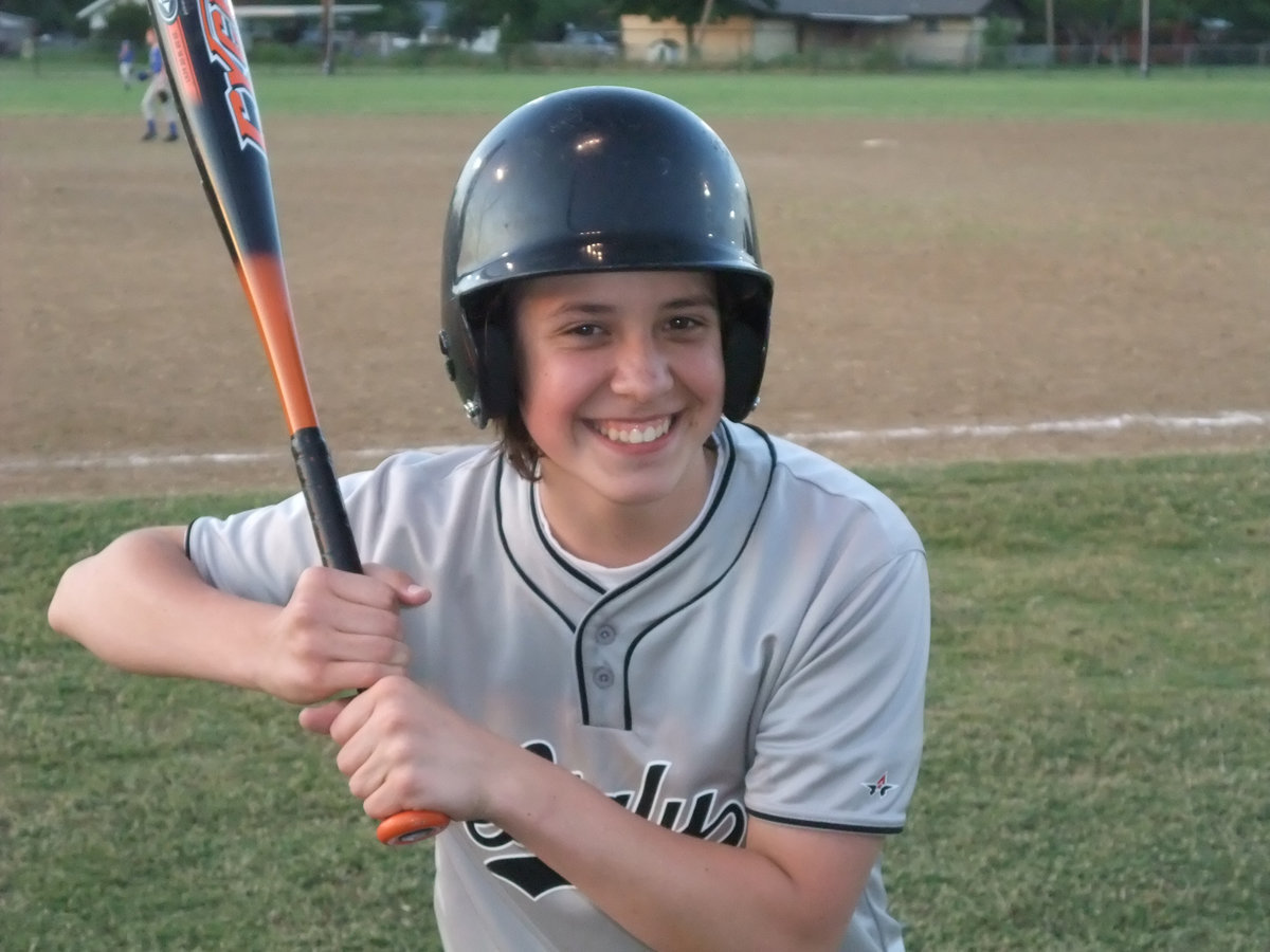 Image: Jacob is serious — Jacob was all business when he smacked a Covington pitch to the left field fence for a triple.