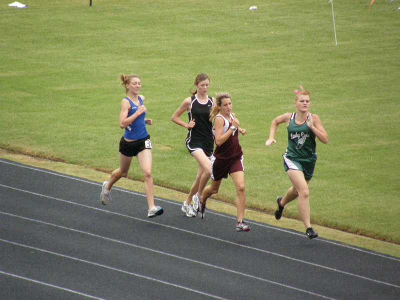 Image: In the pack — Kaitlyn Rossa tries to find some space during her 1600 meter event. Rossa improved on her personal best time by 17 seconds.