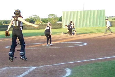 Image: Go-Go-Gadget springs! — Bumpus goes airborne trying to “help” her teammates make the play.