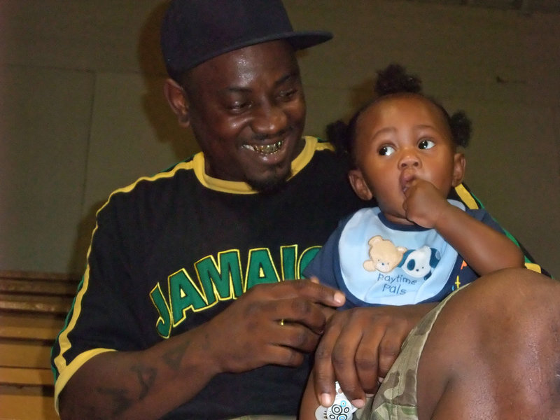 Image: The Copelands — Aaron Copeland and Lil’ Cope jam with their playtime pals during the IYAA games.