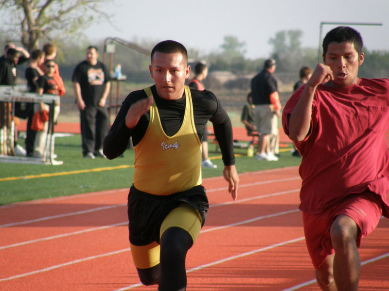 Image: Eyes of a Gladiator — Jacob Lopez sprints toward the finish line.