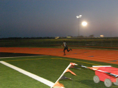 Image: Italy in turn two — Darrin “Butter” Moore turns the corner.