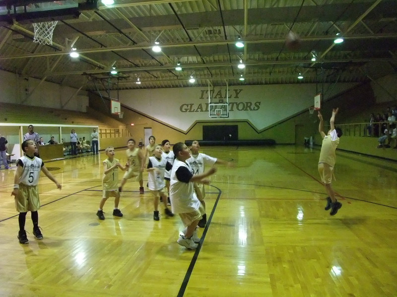 Image: Bombs away! — Italy Gold fires a shot against Italy White. Is Gary Escamilla yelling, “Incoming?”