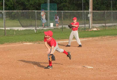 Image: Garret Janek — Garret Janek delivers the fastball….STRIKE 3!