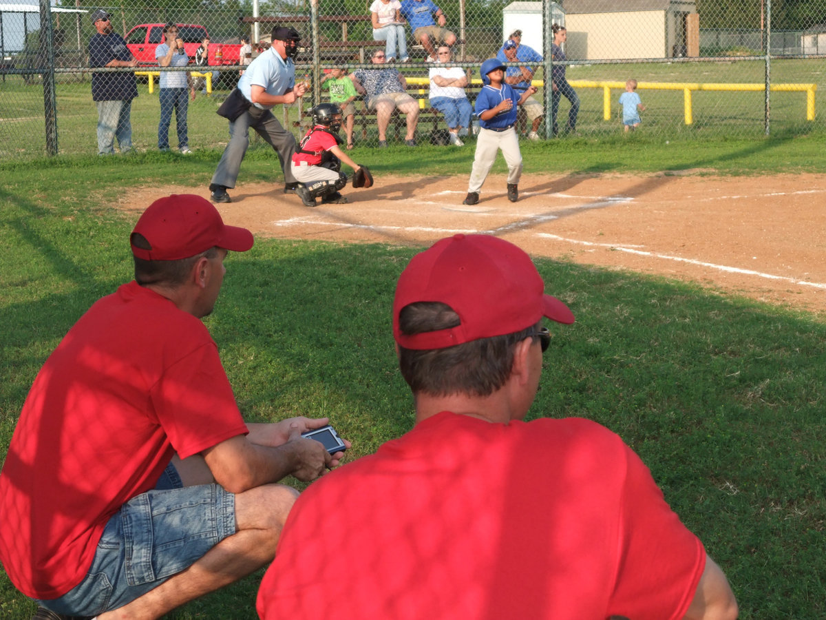 Image: Coaches observe — Coach Stephen Mott and Coach Stephen Janek try to guide their troops to a victory.