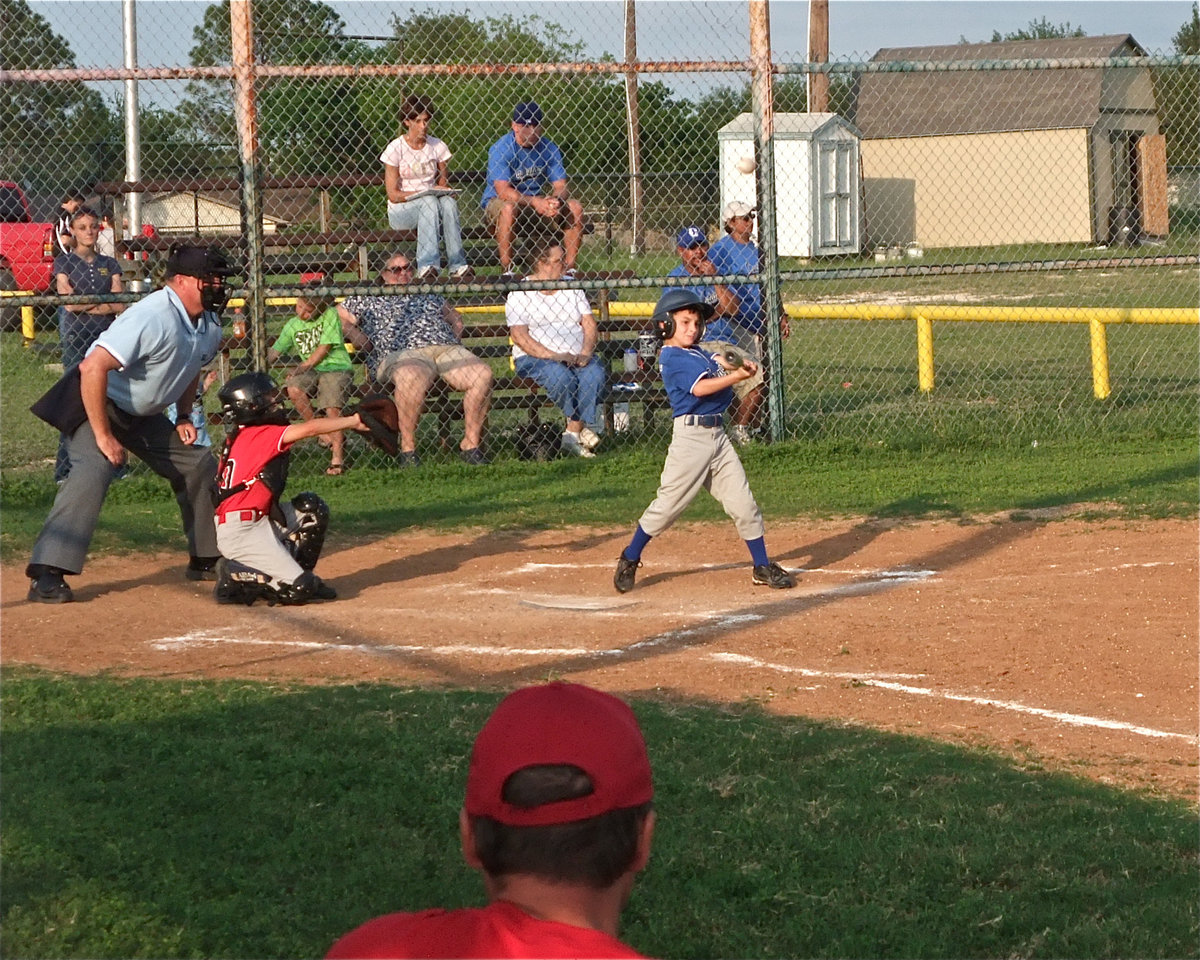 Image: Gary catches — Gary Scott Escamilla does his work behind the plate. However, Covington found a way winning a close one over Italy, 8-7.