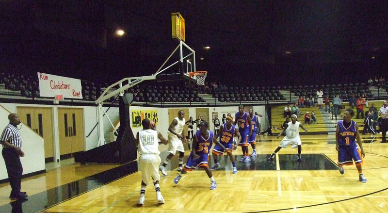 Image: Isaac in the corner — John Isaac #10 tries to fight Italy’s way out of a corner in the early rounds as the Gladiators trailed most of the 1st half.