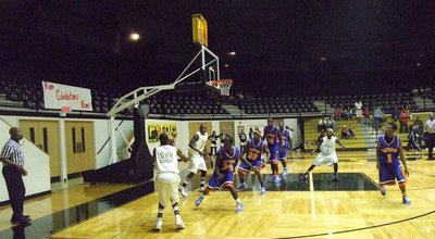 Image: Isaac in the corner — John Isaac #10 tries to fight Italy’s way out of a corner in the early rounds as the Gladiators trailed most of the 1st half.