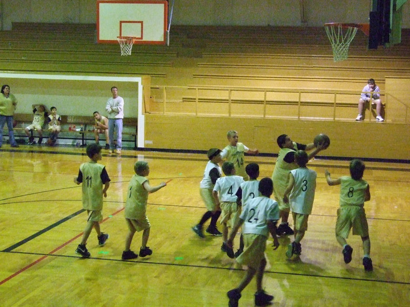 Image: Muscle In The Middle — Adrian Acevedo rebounds with power just like his mom, Assistant Coach Yvonne Acevedo, used to do back when she was an All-District basketball player for the Italy Lady Gladiators.
