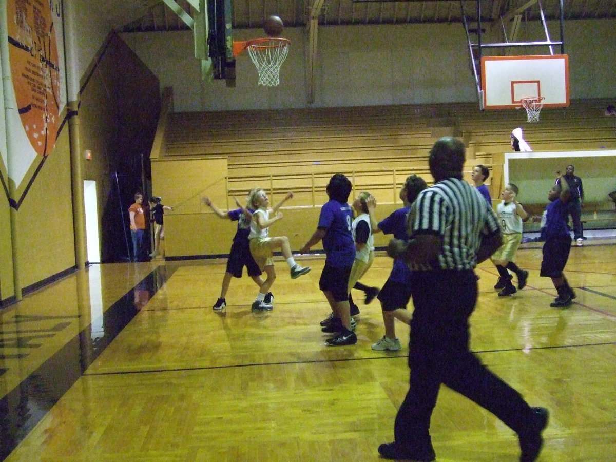 Image: Cody Challenges — Italy 29’s #20 Cody Boyd tries to thwart the efforts of a Hillsboro Navy Blue player.