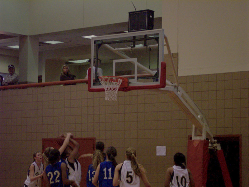 Image: Fleming Gets Fouled — Italy’s #32 Shay Fleming gets fouled going up for a basket.