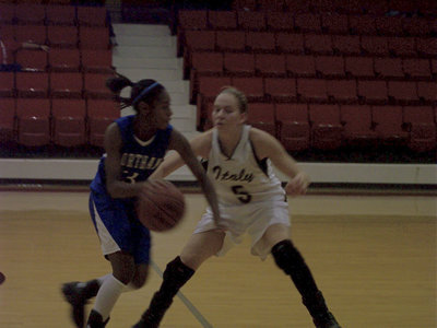 Image: DeMoss Defends — Italy’s #5 Becca DeMoss tries to slow the Bulldog attack.