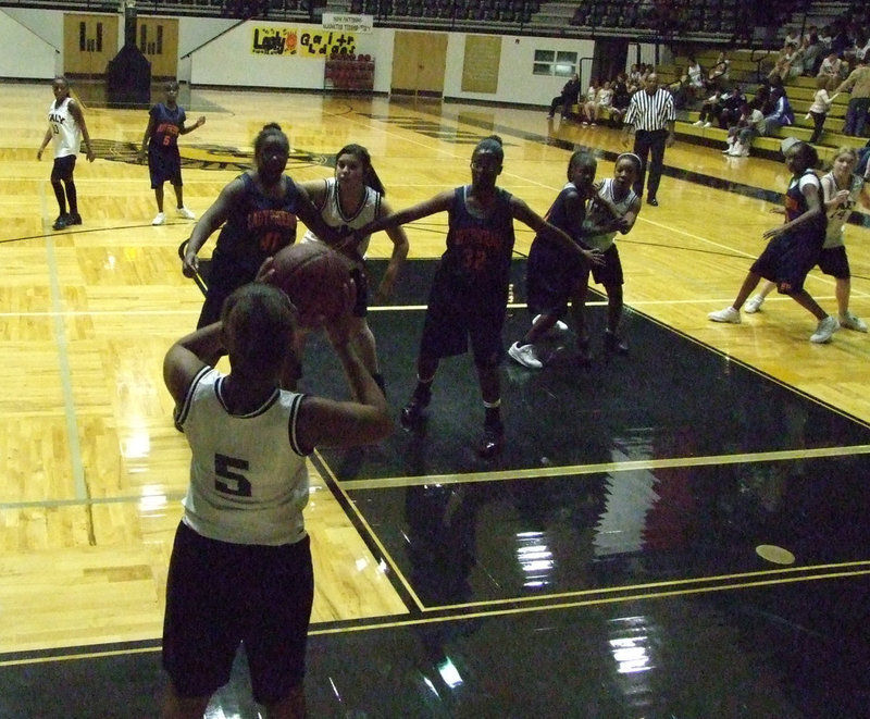Image: Harper brings in the ball — The Italy 7th grade girls played hard against Hampton on Monday.