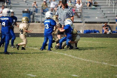 Image: Gladiators swarm the ball — The defense brought ’em down!