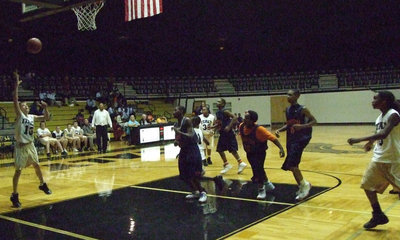 Image: Wood is open — #13 Justin Wood tries to haul-in a pass before Hampton’s defense can recover.