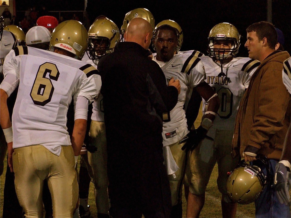 Image: Words of wisdom — Coach Jeff Richters talks with the Gladiators’ defense late in the game.