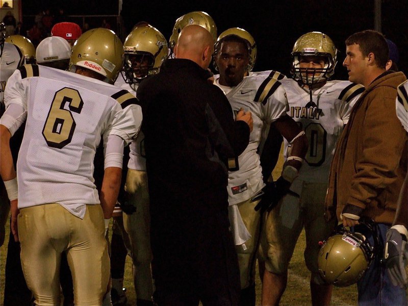 Image: Words of wisdom — Coach Jeff Richters talks with the Gladiators’ defense late in the game.