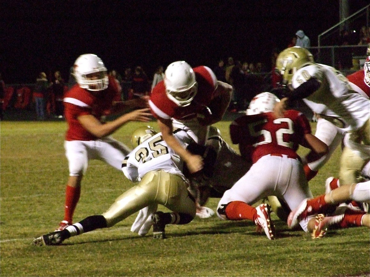 Image: Big play — Italy’s Corrin Frazier(25) stops Brandon Bordovsky(20) on fourth and short to give the Gladiators’ offense a chance to the tie in the game’s closing moments.