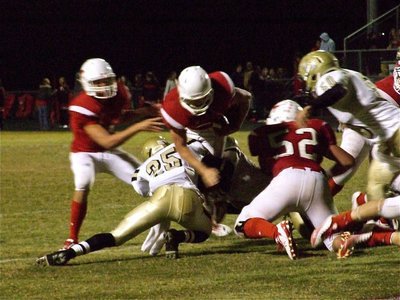 Image: Big play — Italy’s Corrin Frazier(25) stops Brandon Bordovsky(20) on fourth and short to give the Gladiators’ offense a chance to the tie in the game’s closing moments.