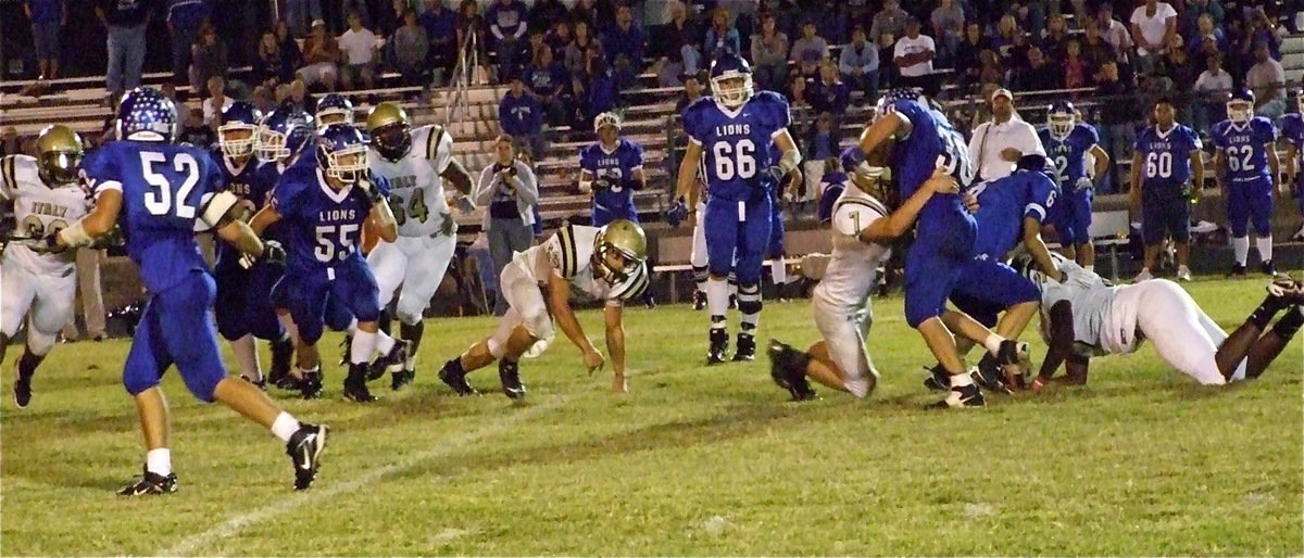 Image: Wilkins tackles — Gladiator Kyle Wilkins(7) tackles Blooming Grove running back Stewart Chambers(30).