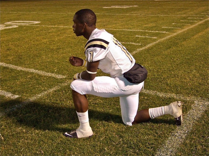 Image: Early exit — Senio gets sidelined but encourages his his teammates the rest of the way.