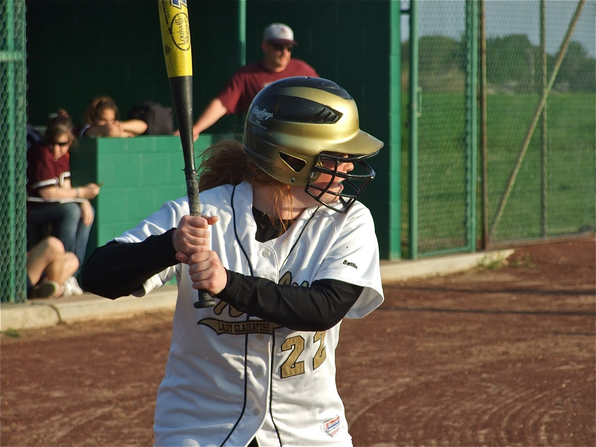 Image: “Bring me the heat.” — Katie Byers waits for just the right pitch.