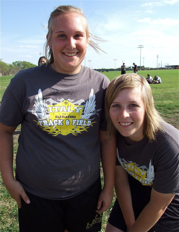 Image: Drenda and Imke — The discus would not be an event without Drenda Burk’s participation as she poses for a picture with track teammate, Imke Klindworth. There were no innocent bystanders harmed during Burk’s throw.