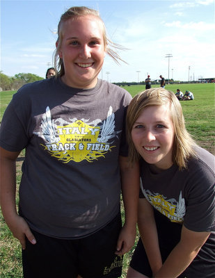 Image: Drenda and Imke — The discus would not be an event without Drenda Burk’s participation as she poses for a picture with track teammate, Imke Klindworth. There were no innocent bystanders harmed during Burk’s throw.