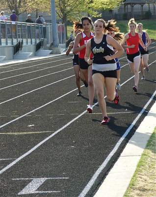 Image: Strong start — Breyanna Beets lead the entire first lap around the track during the 800 meter run but eventually slowed her pace and finished in 6th place.