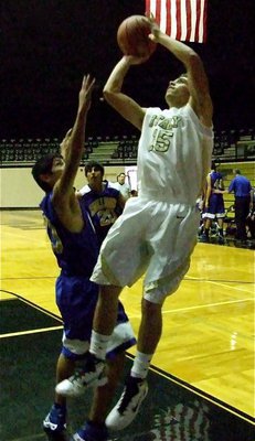 Image: Souder scores inside — Gladiator Brandon Souder(15) scores inside for 2-points against the Venus J.V. squad.