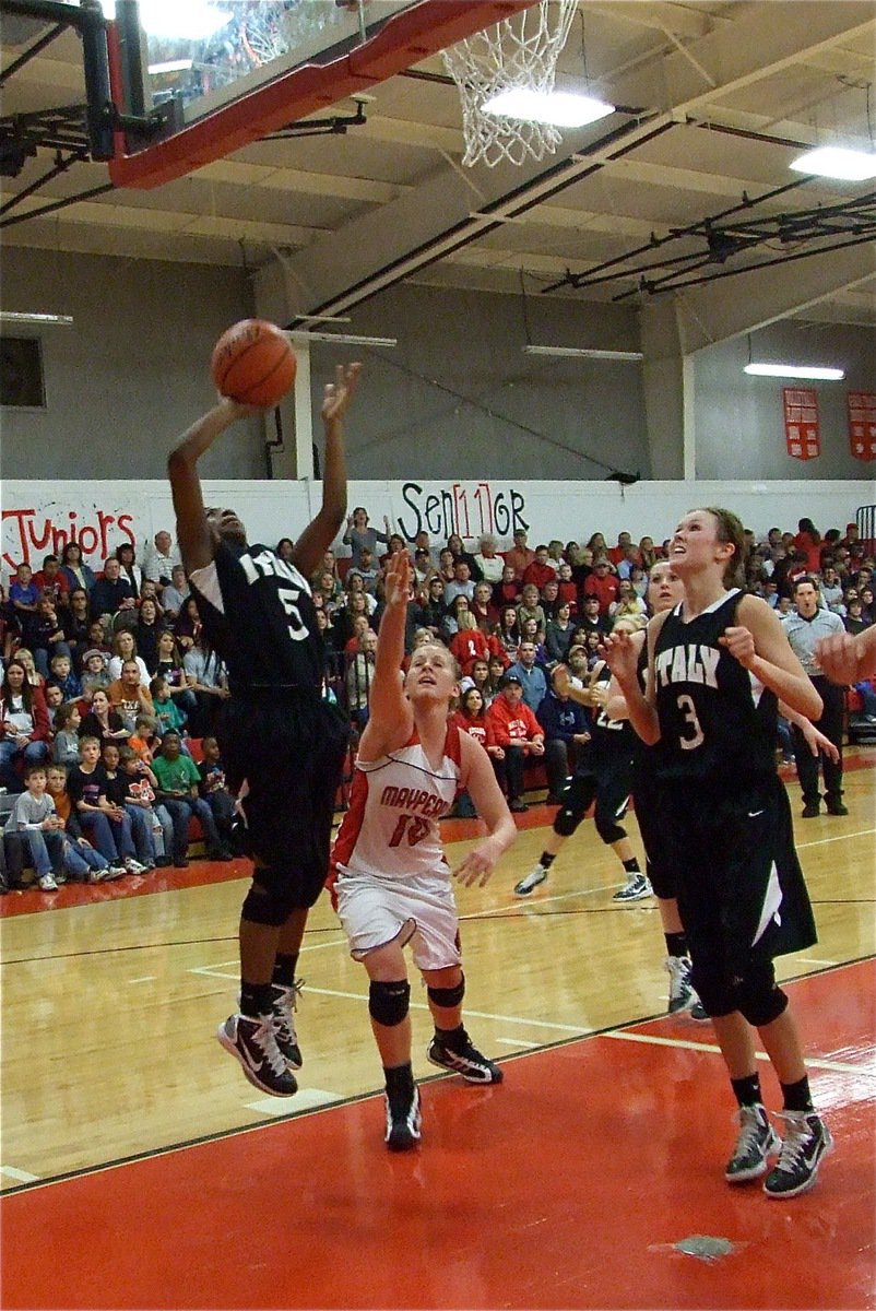 Image: Jameka scores — Italy’s Jameka Copeland(5) lays in a bucket with teammate Kaitlyn Rossa(3) ready to rebound.