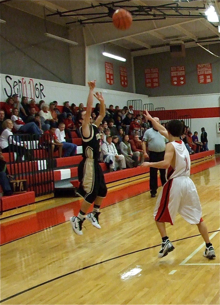 Image: Caden connects — Caden Jacinto(2) knocks down a three-pointer for the JV Gladiators.