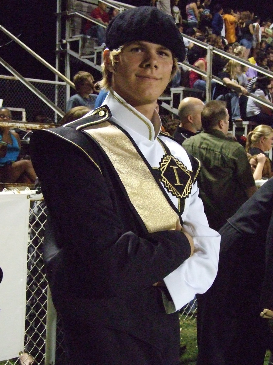 Image: Cool Gus — Gus Allen displays the newly arrived band uniform.  Don’t they look great?