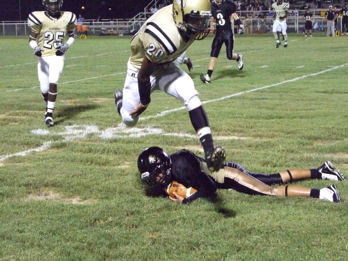 Image: Sephus becomes a gazelle — De’Andre Sephus (20) jumps quickly over this Jaguar.
