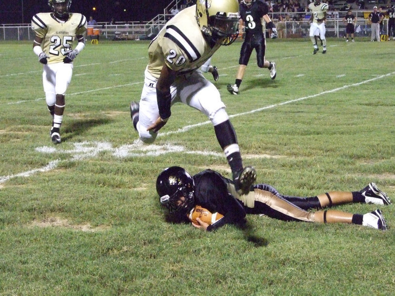 Image: Sephus becomes a gazelle — De’Andre Sephus (20) jumps quickly over this Jaguar.