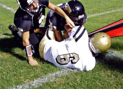Image: Six short of sticks — Jase Holden(6) gets knocked out just short of the sticks for a 9-yard pass reception.