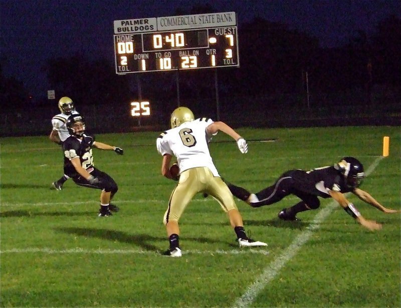 Image: Going for 6 — Jase Holden(6) collects another pass from Anderson and fights his way to the 1-yard line hoping to add 6-more points on the guest side of the scoreboard.