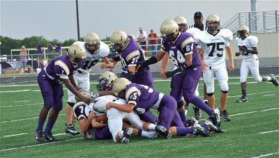 Image: Chase goes for it — Chase Hamilton lowers his head for one more yard to get the first down on fourth and 7-yards to go.