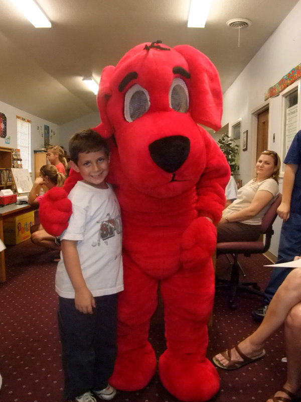 Image: Garrett and Clifford — Garrett Everette gave Clifford a great big hug.