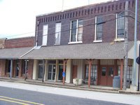 Image: The Closet Store and condemned Community Center, Italy, Texas