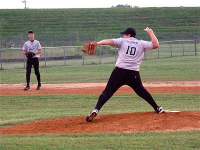 Image: Rock-n-Roldan — Kevin Roldan starts off on the mound for the Gladdogs against Whitney with Eric Evans on third base.