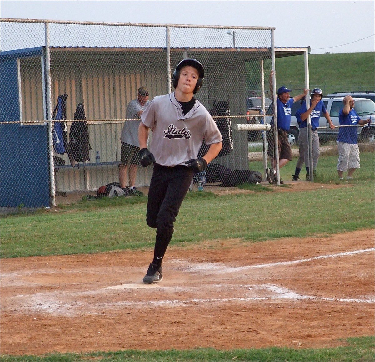 Image: That’s two — Eric Evans crosses home plate after banging in his second home run of the game.