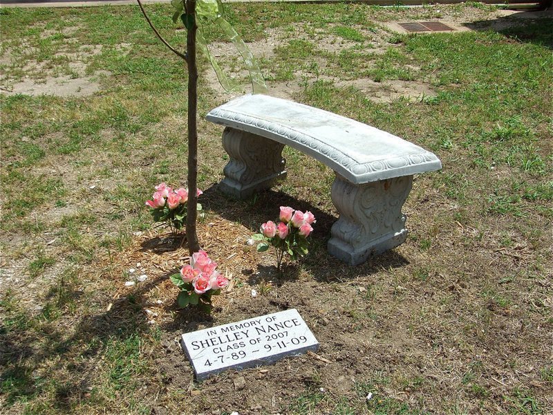 Image: Shelley’s Garden — Marked by an engraved stone and offset by a decorative bench, the Shelley Nance Memorial Garden reminds us to live life and follow your dreams. The bench was donated by Mrs. Marjorie Bridge, Shelley’s High School Biology Teacher.