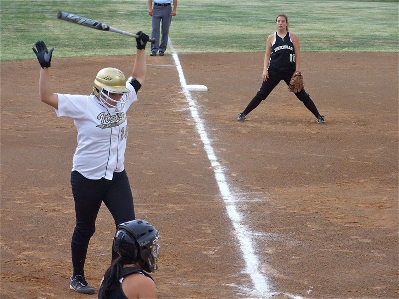 Image: Jeffords steps it up — Cori Jeffords(15) steps up to the plate and rockets a 220 foot homerun over the Meridian defense and over the centerfield fence in Joshua. History repeats itself as Jeffords duplicated her over the fence homerun effort from a year ago against Meridian during this same regional quarterfinal matchup.