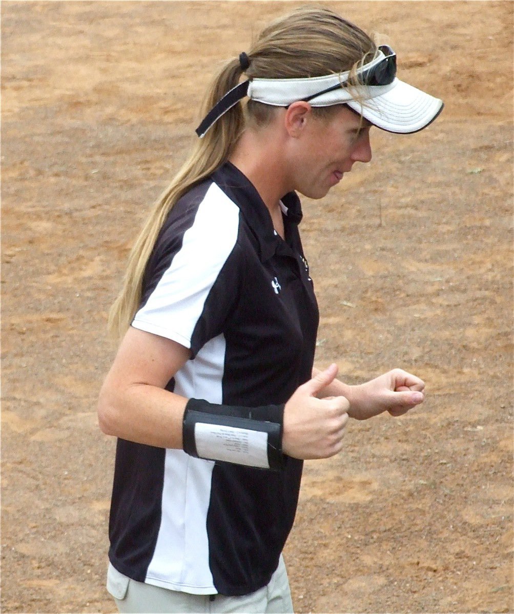 Image: Reeves is pumped — Italy head coach Jennifer Reeves is pumped up after the over the fence solo homerun blast by Cori Jeffords.
