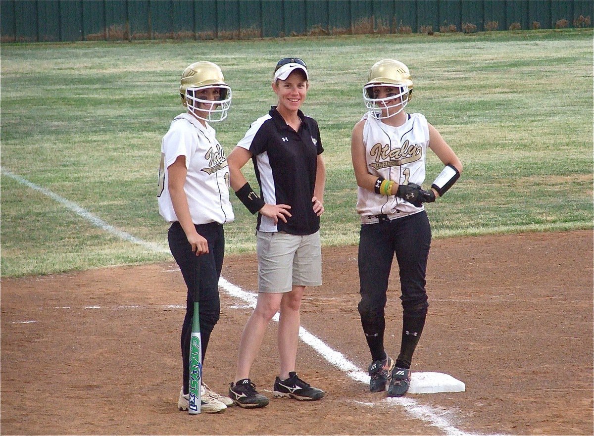 Image: Winning pose — OMG! Courtney Westbrook, Coach Jennifer Reeves and Drew Windham actually mug for the camera during a timeout. That’s confidence!