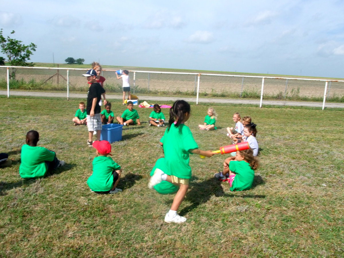 Image: Duck Duck Squirt Game — Who is she going to pick?