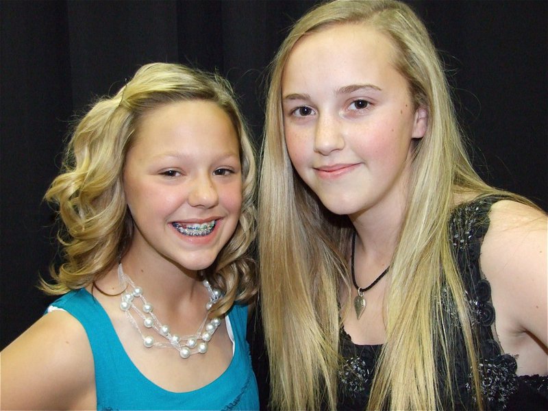 Image: Bailey & Kelsey — Alto sax player Bailey Eubank and 1st chair trombonist Kelsey Nelson are all dressed up and ready to play