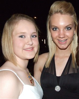 Image: Jesica &amp; Sierra — Gladiator Regiment Band flute players Jesica Wilkins and Sierra Harris are pleased with their band’s performance after the Spring Concert.